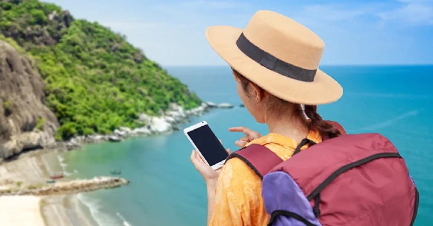 Budget-Friendly Trip Australian traveler using PocketSmith app on smartphone for budget-friendly trip planning.