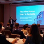 Professional presenter speaking to audience about first-time home buyer programs in Australia, with colorful slide showing modern residential buildings and program benefits displayed on large screen in conference room
