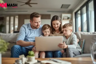 Australian family sitting in a modern living room, using a laptop to review their term life insurance policy online and discuss coverage options.