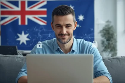 Australian person using a laptop with digital privacy and data protection symbols in background
